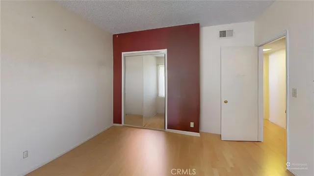 a bathroom with a bath tub with a shower