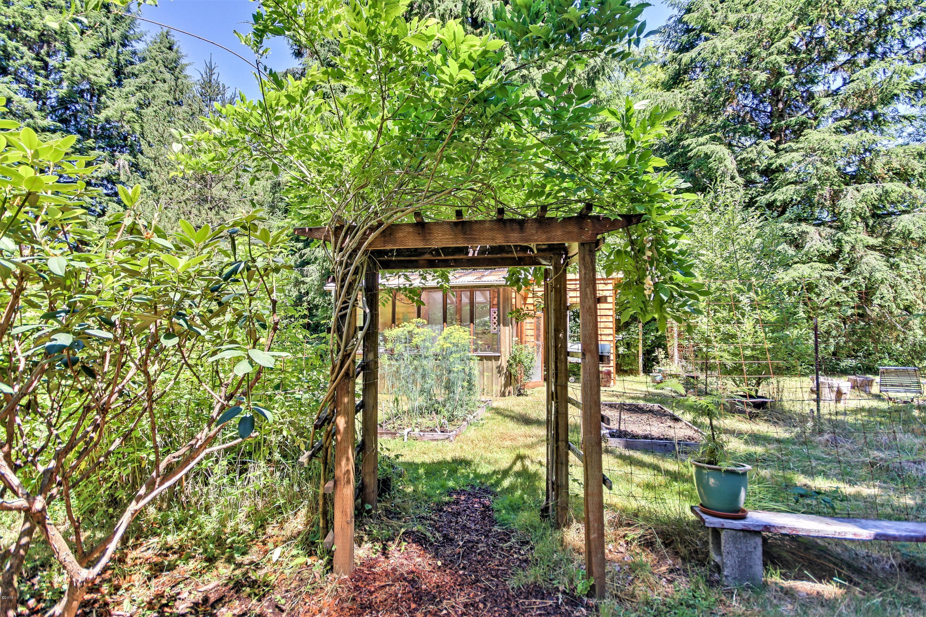 1754 Old River Road Northeast Siletz, OR 97380 - Photo 8 of 42 Wisteria Trellis, entry to the Garden