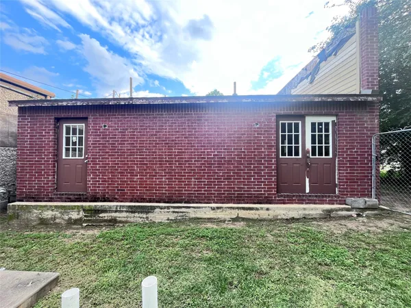 a fire hydrant in the middle of a field