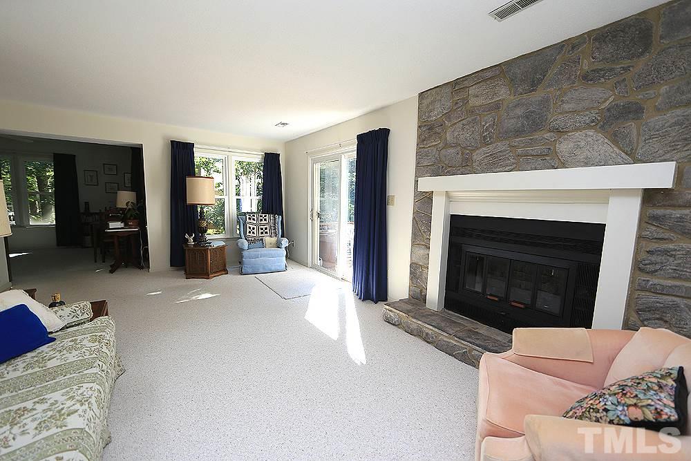 1506 Edgeside Court Raleigh, NC 27609 - Photo 8 of 23 Stone surround fireplace