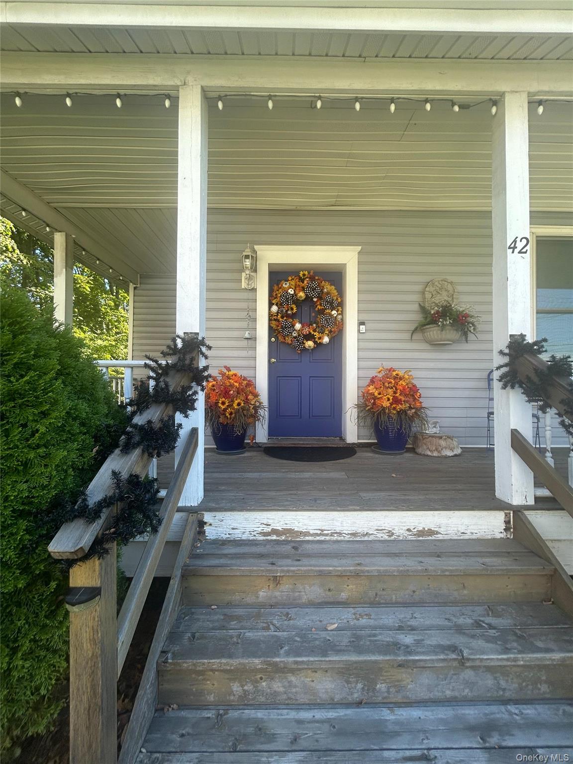a front view of a house with outdoor space