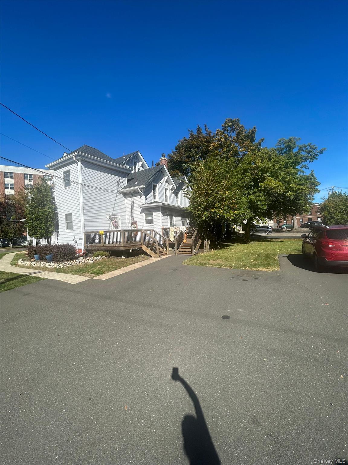 42 Park Avenue, Unit 3 Suffern, NY 10901 - Photo 2 of 13 a view of building with car parked on the road