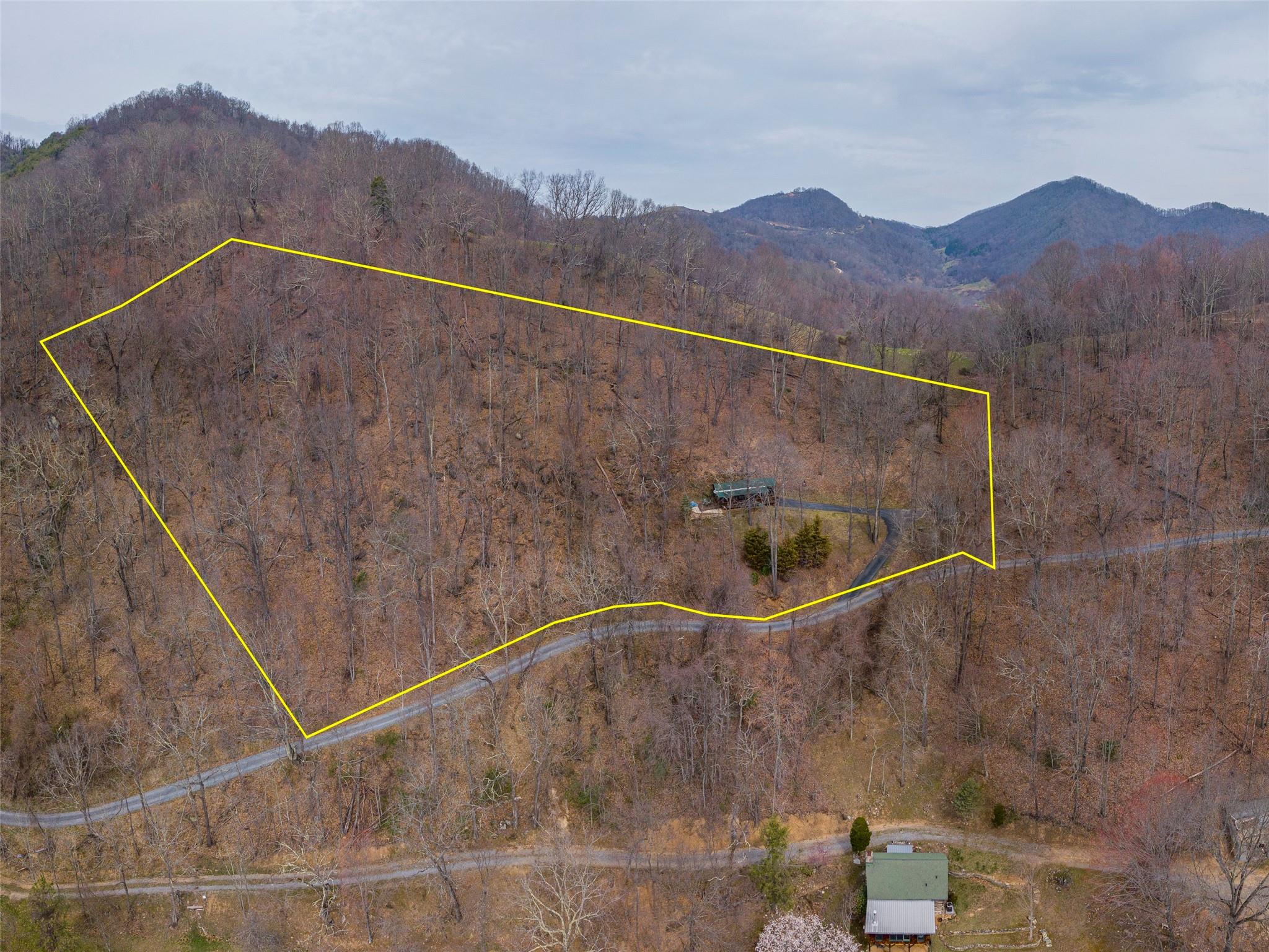 239 Sugar Hill Road Clyde, NC 28721 - Photo 18 of 20 a view of a mountain from a balcony