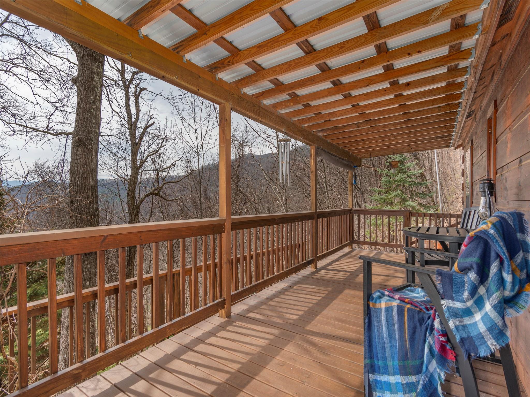239 Sugar Hill Road Clyde, NC 28721 - Photo 4 of 20 a view of balcony with furniture