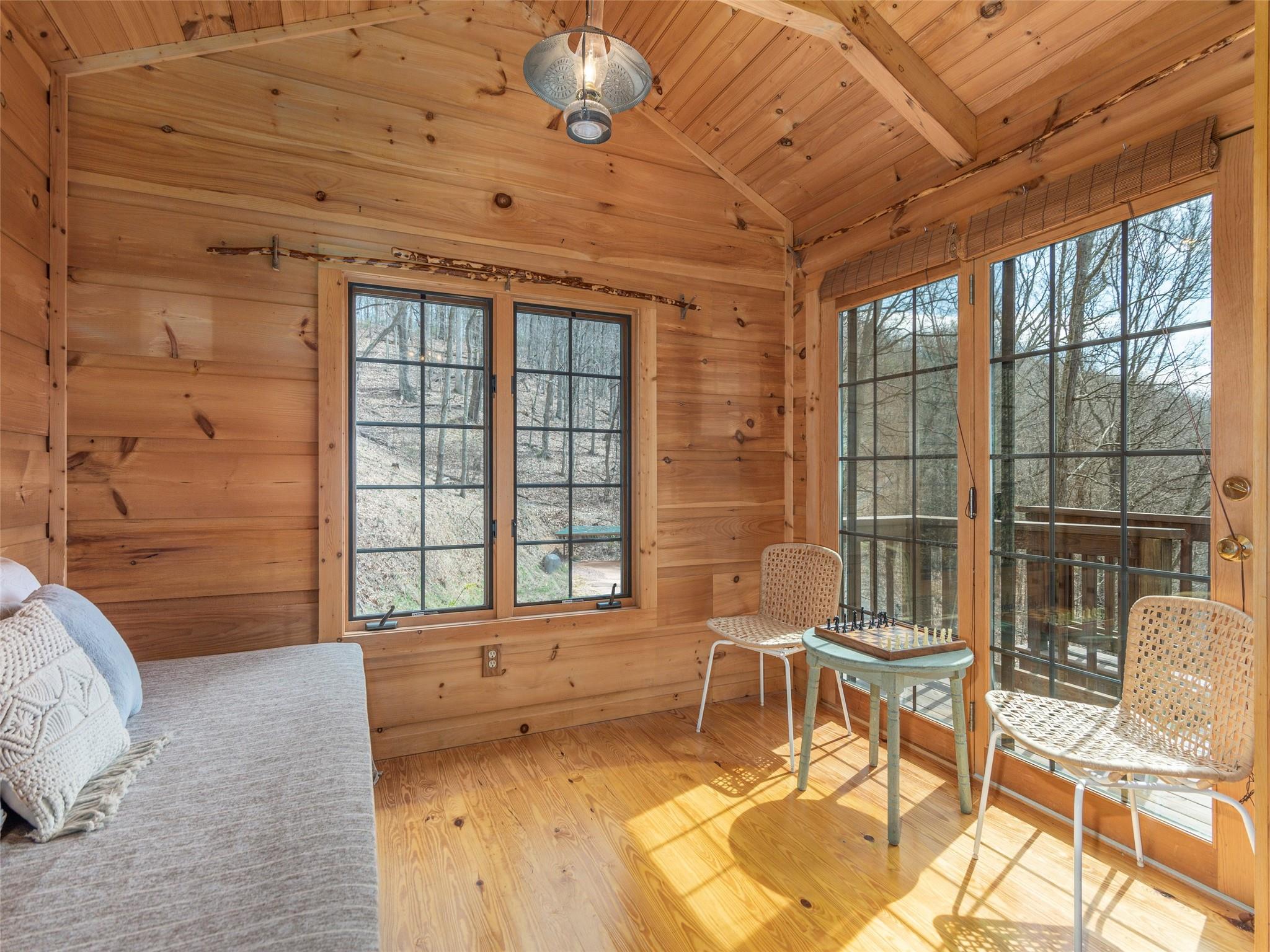 239 Sugar Hill Road Clyde, NC 28721 - Photo 8 of 20 a view of a livingroom with furniture and windows