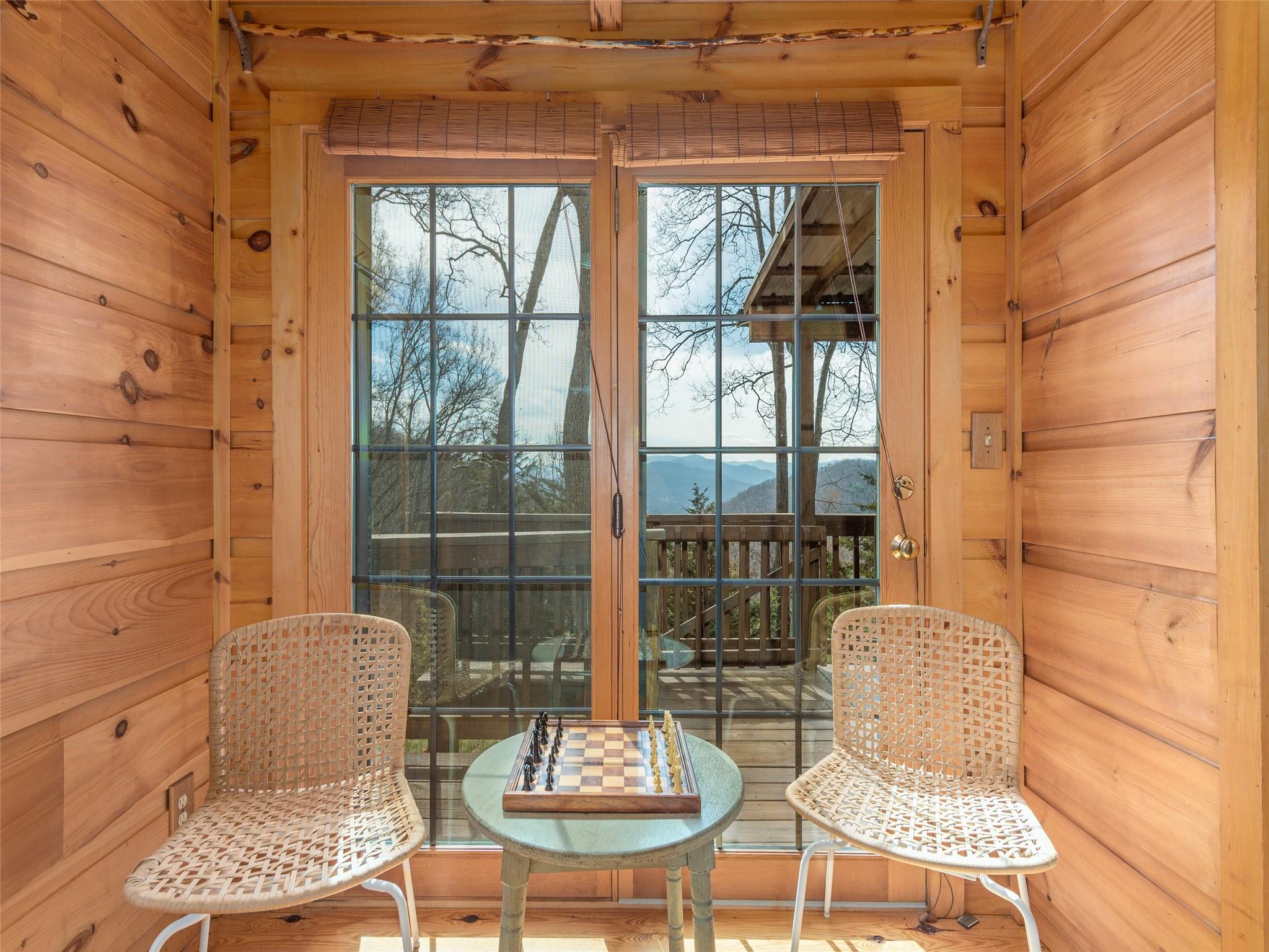 239 Sugar Hill Road Clyde, NC 28721 - Photo 9 of 20 a outdoor living space with furniture and a window