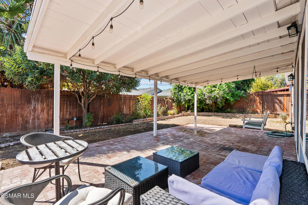 3998 Celia Court Simi Valley, CA 93063 - Photo 15 of 44 a backyard of a house with table and chairs