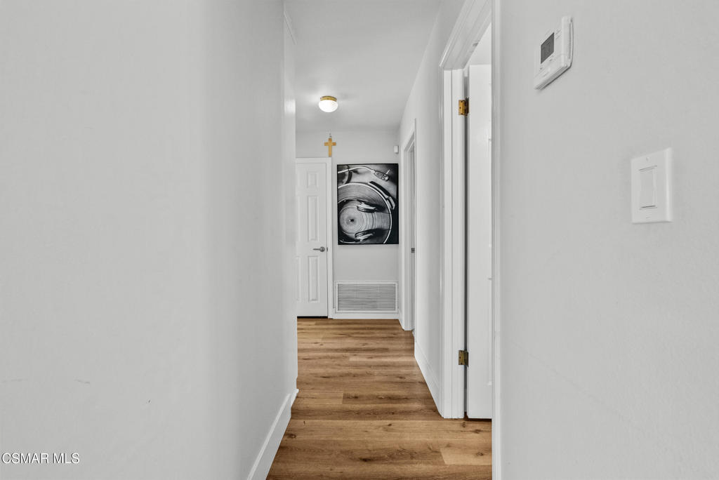 3998 Celia Court Simi Valley, CA 93063 - Photo 27 of 44 a view of a hallway with white doors