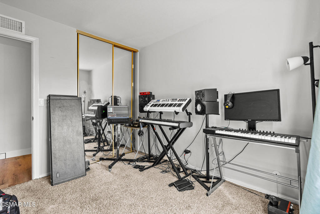3998 Celia Court Simi Valley, CA 93063 - Photo 31 of 44 a view of a livingroom with furniture and a flat screen tv
