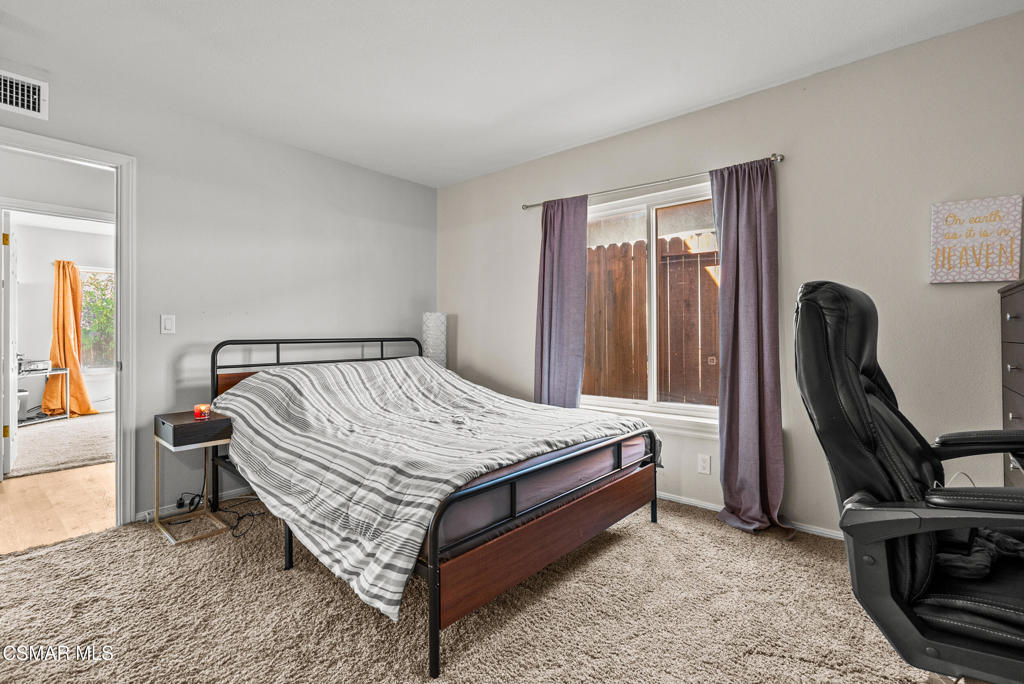 3998 Celia Court Simi Valley, CA 93063 - Photo 34 of 44 a bed sitting in a room next to a window