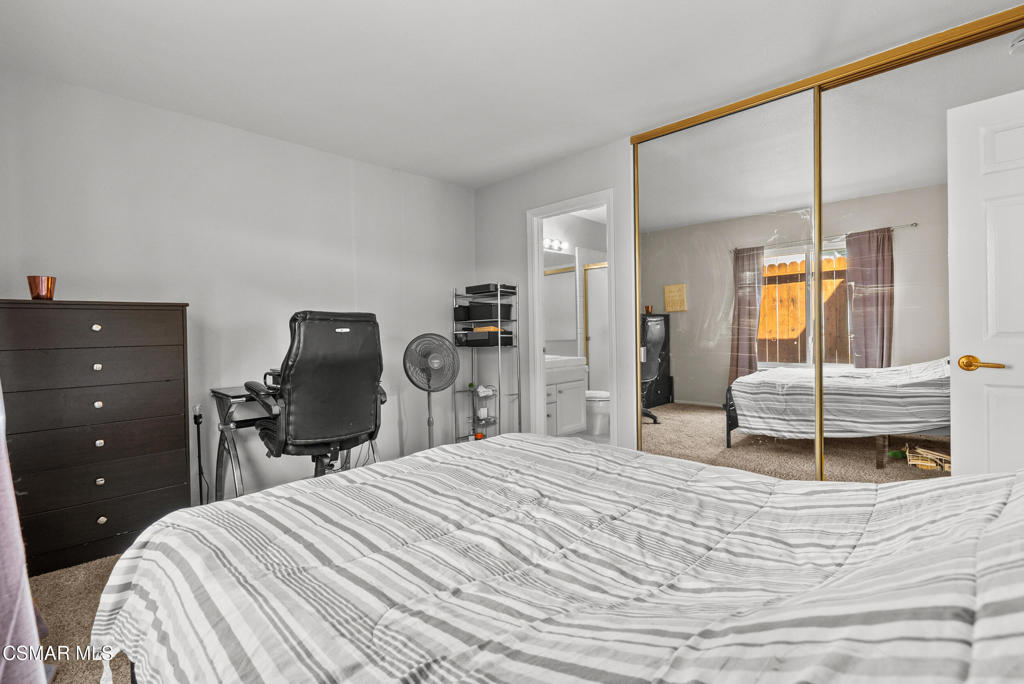 3998 Celia Court Simi Valley, CA 93063 - Photo 36 of 44 a bedroom with a bed and a large mirror on dresser
