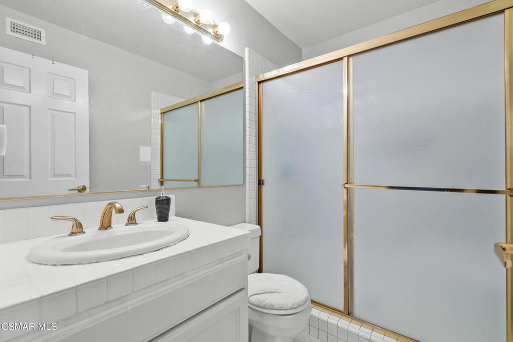 3998 Celia Court Simi Valley, CA 93063 - Photo 37 of 44 a bathroom with a sink and a mirror