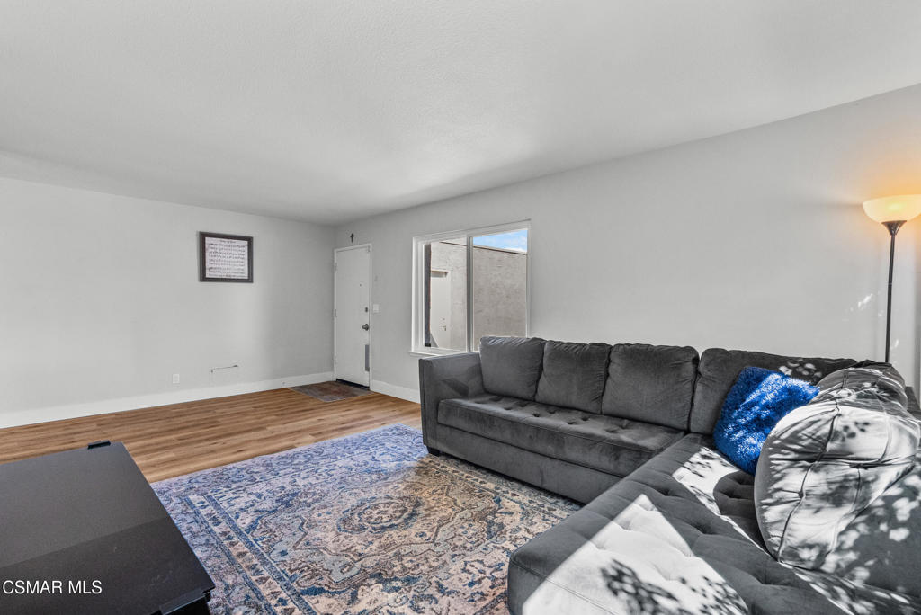 3998 Celia Court Simi Valley, CA 93063 - Photo 41 of 44 a living room with a couch and a rug