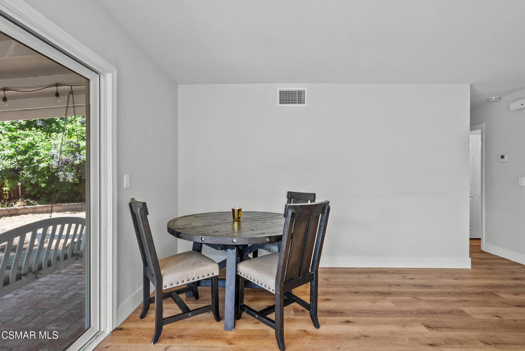 3998 Celia Court Simi Valley, CA 93063 - Photo 44 of 44 a view of a dining room with furniture and wooden floor