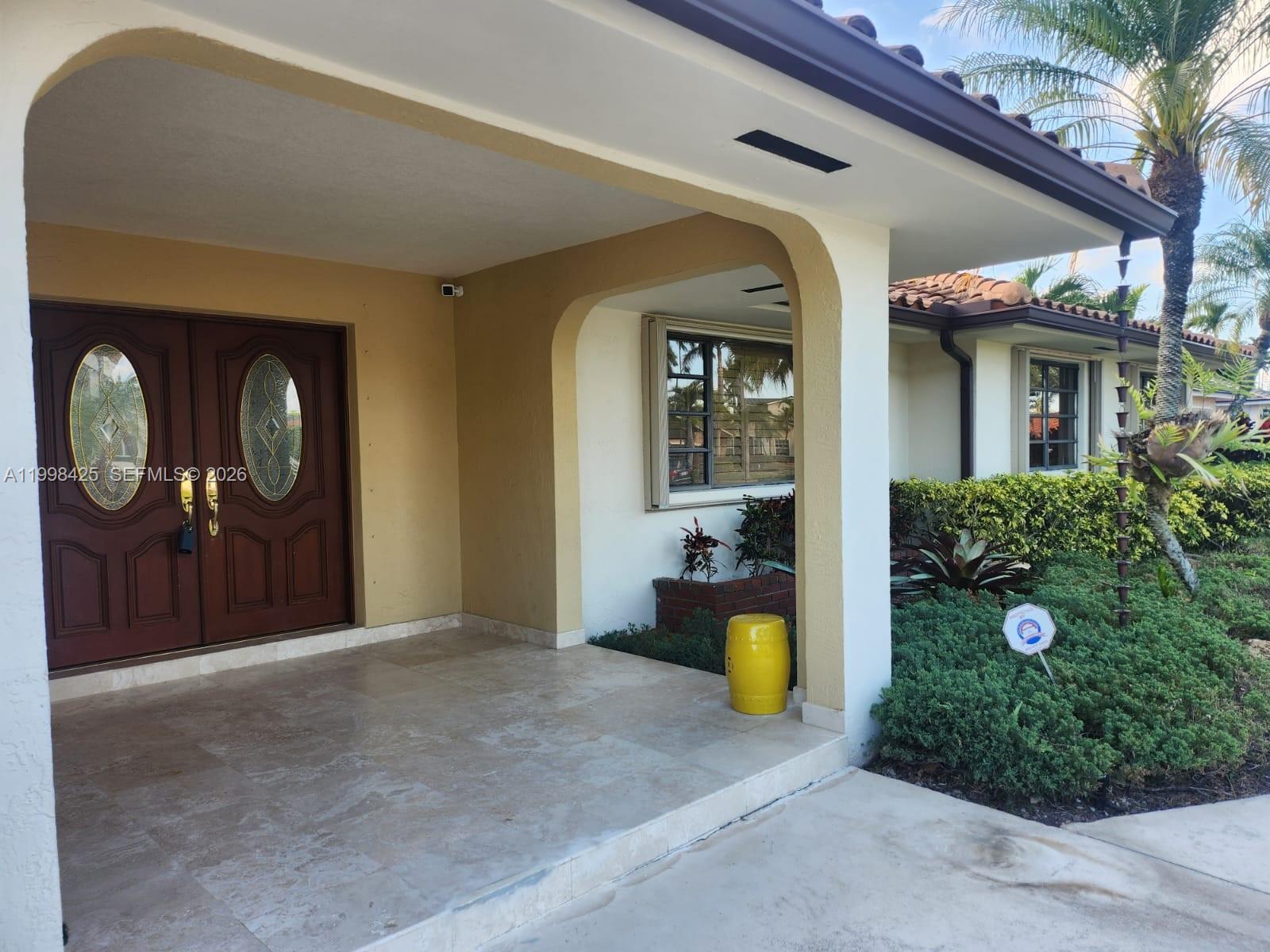 2980 Southwest 111th Avenue Miami, FL 33165 - Photo 2 of 39 a view of a living room and bathroom