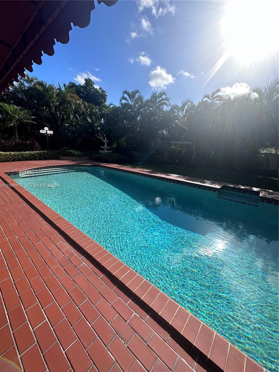 2980 Southwest 111th Avenue Miami, FL 33165 - Photo 31 of 39 a view of an outdoor space and a yard