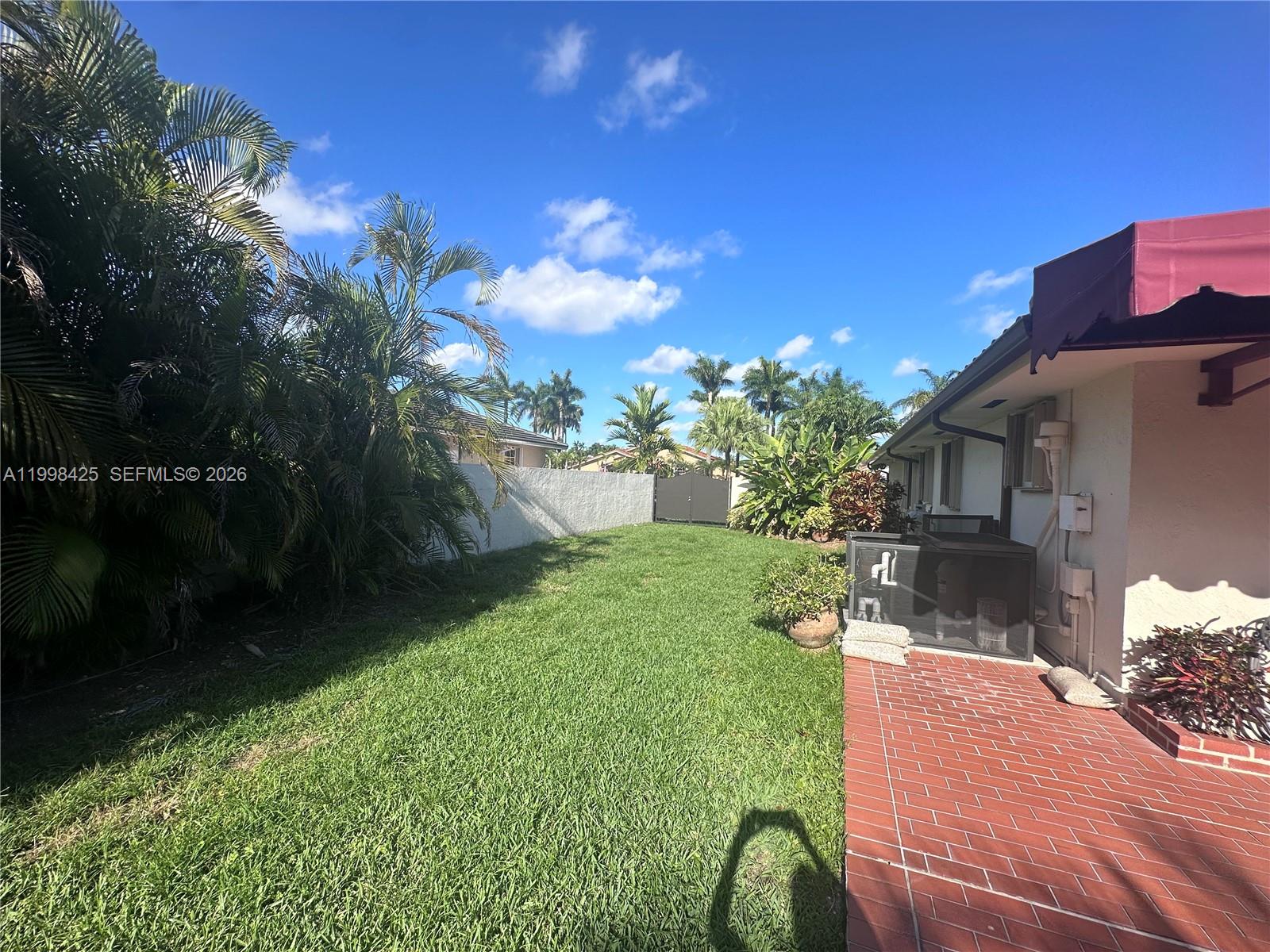 2980 Southwest 111th Avenue Miami, FL 33165 - Photo 33 of 39 a view of a yard with fountain
