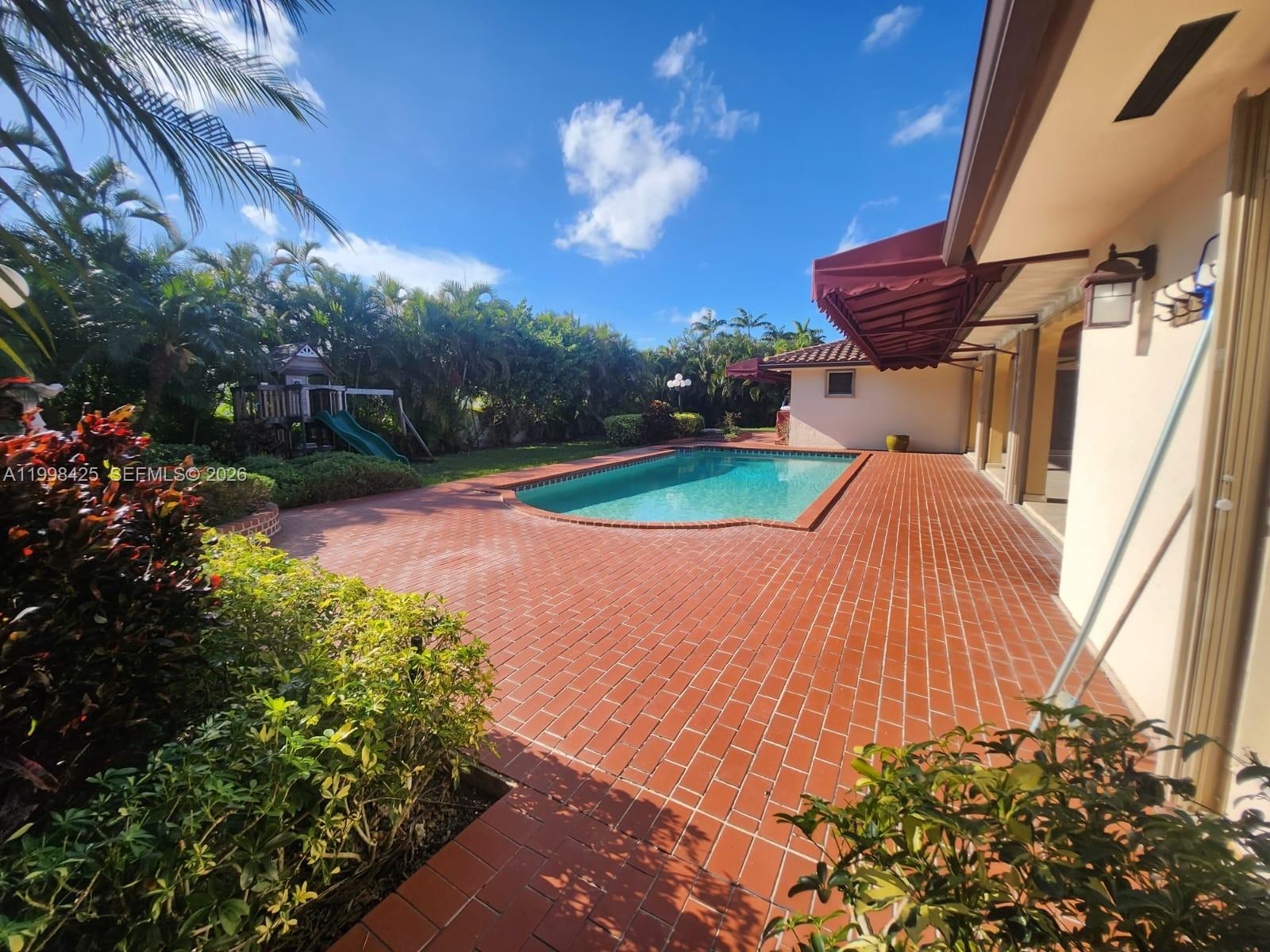 2980 Southwest 111th Avenue Miami, FL 33165 - Photo 37 of 39 a view of a backyard