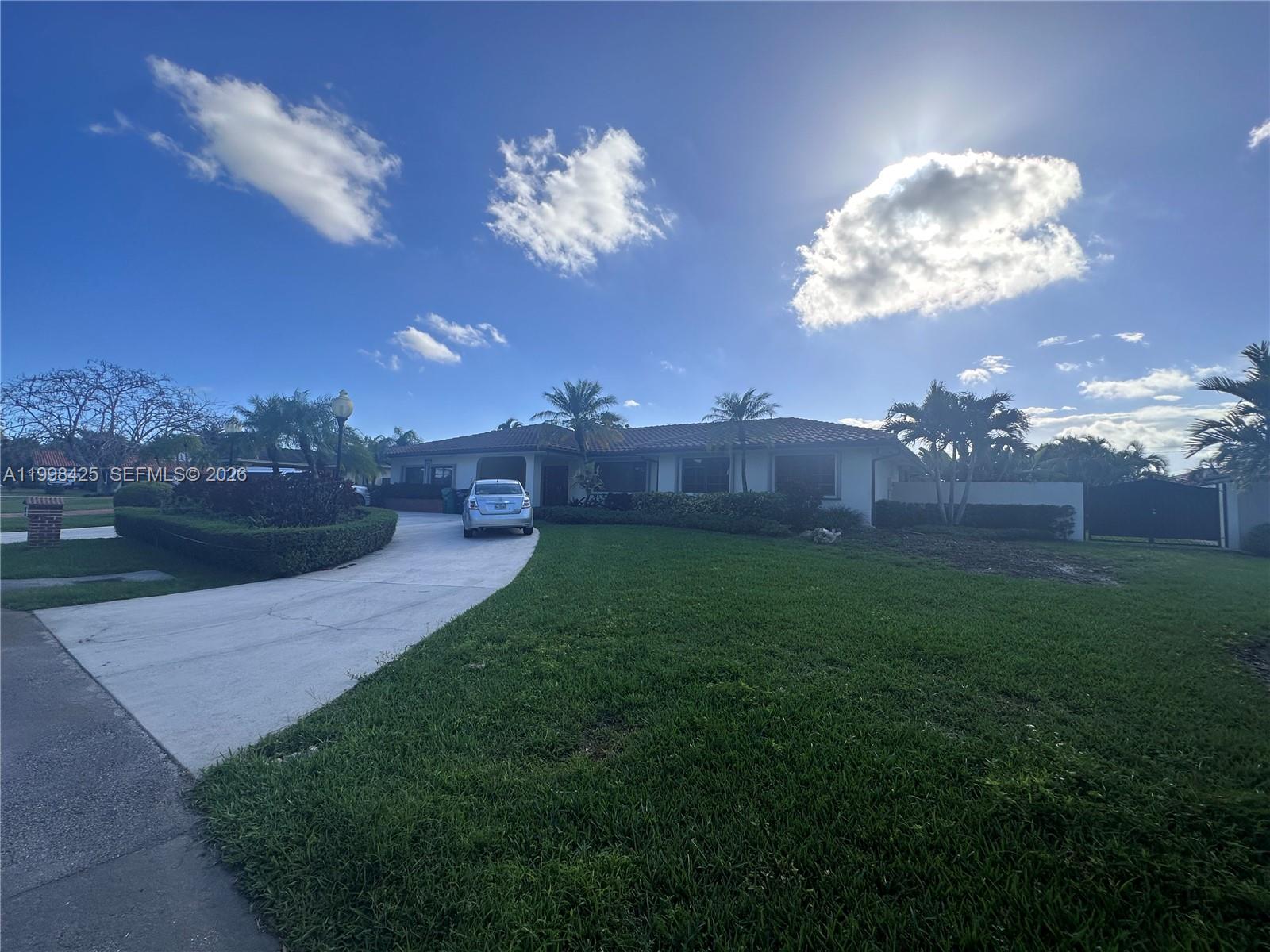 2980 Southwest 111th Avenue Miami, FL 33165 - Photo 38 of 39 a view of a house with a big yard