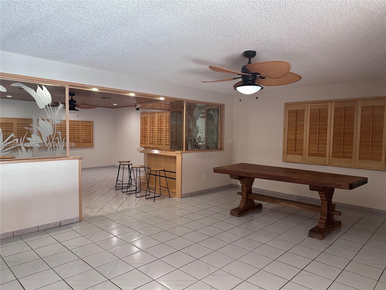 2980 Southwest 111th Avenue Miami, FL 33165 - Photo 10 of 39 a bedroom with furniture and a window