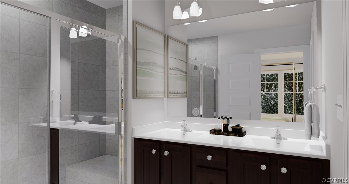 12208 Lightning Bug Loop Midlothian, VA 23112 - Photo 14 of 36 a bathroom with a double vanity sink mirror and double