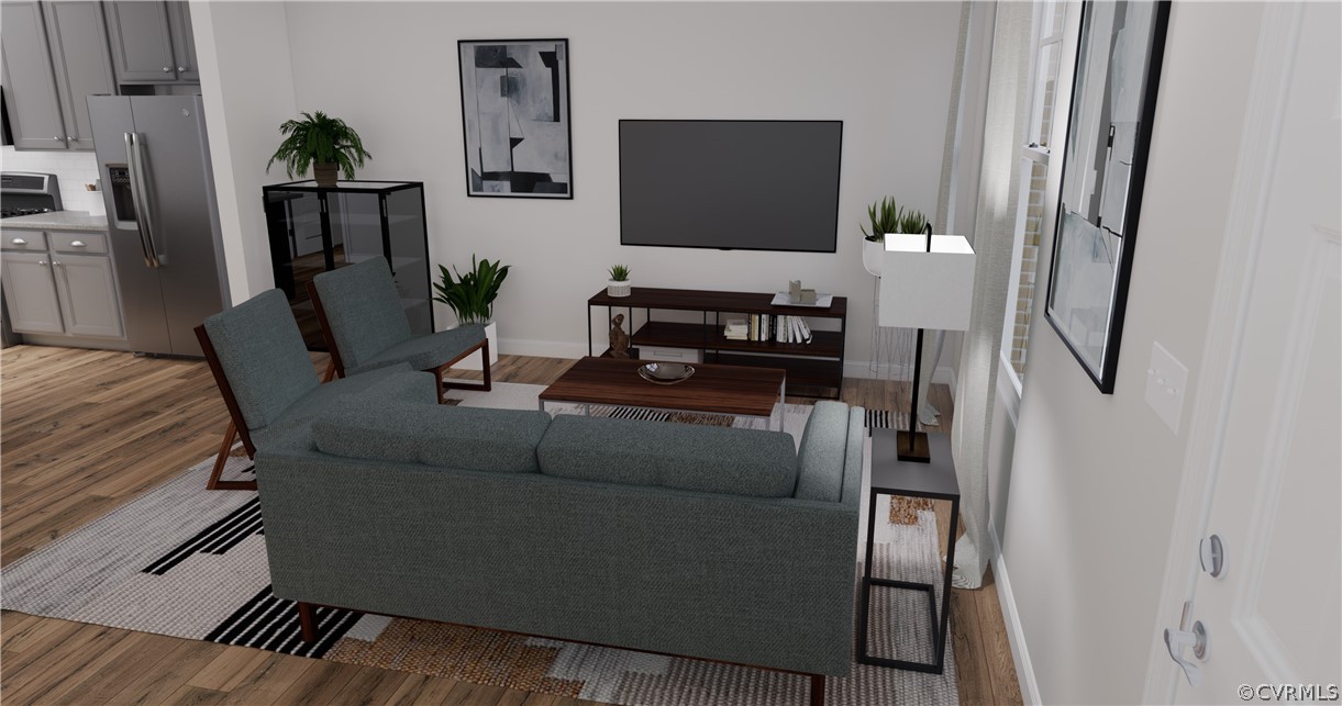 12208 Lightning Bug Loop Midlothian, VA 23112 - Photo 5 of 36 a living room with furniture and a flat screen tv