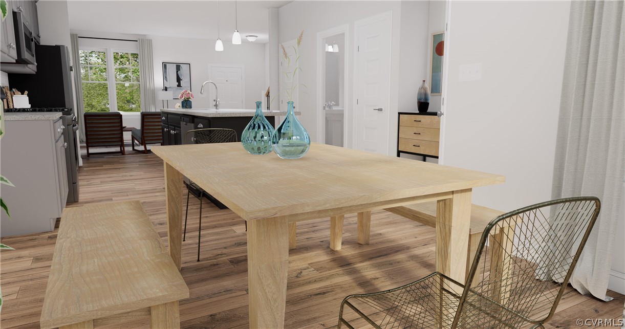12208 Lightning Bug Loop Midlothian, VA 23112 - Photo 8 of 36 a view of kitchen with furniture and wooden floor