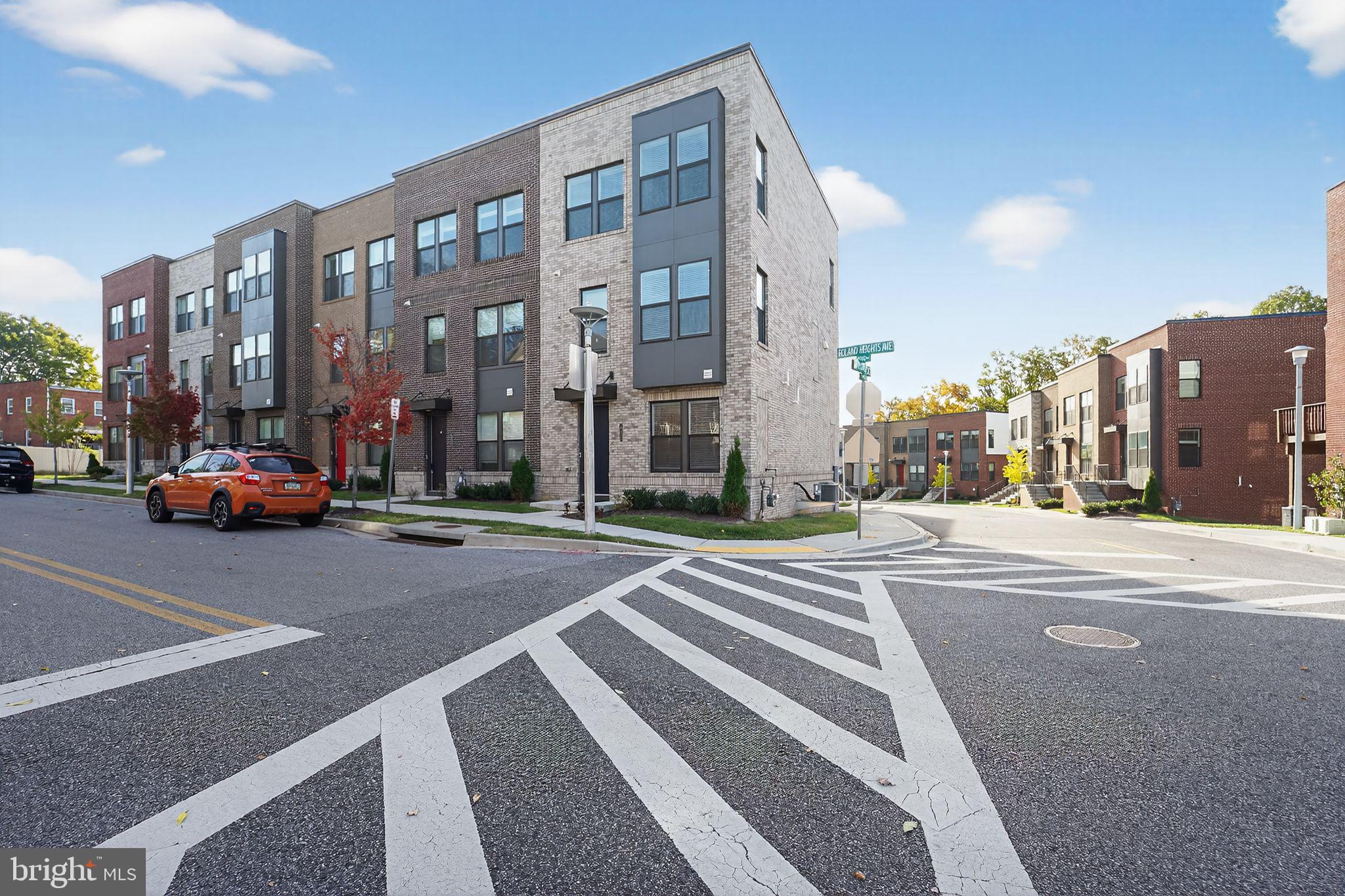1511 Roland Heights Avenue Baltimore, MD 21211 - Photo 2 of 42 a view of a street with a building in the background