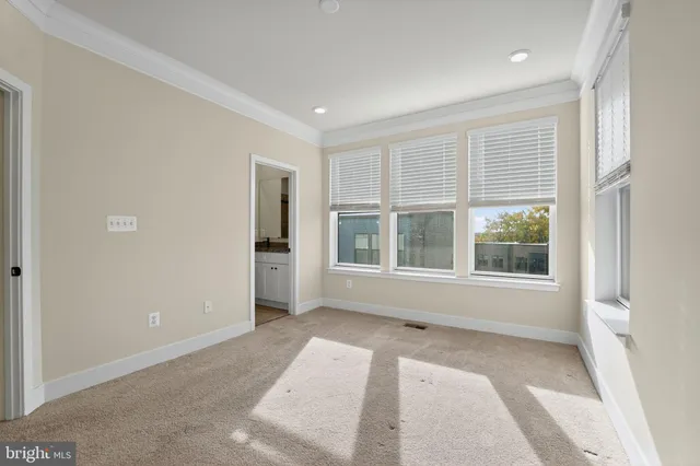 an empty room with windows