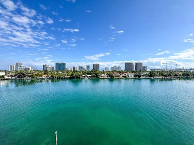 a view of a lake with houses