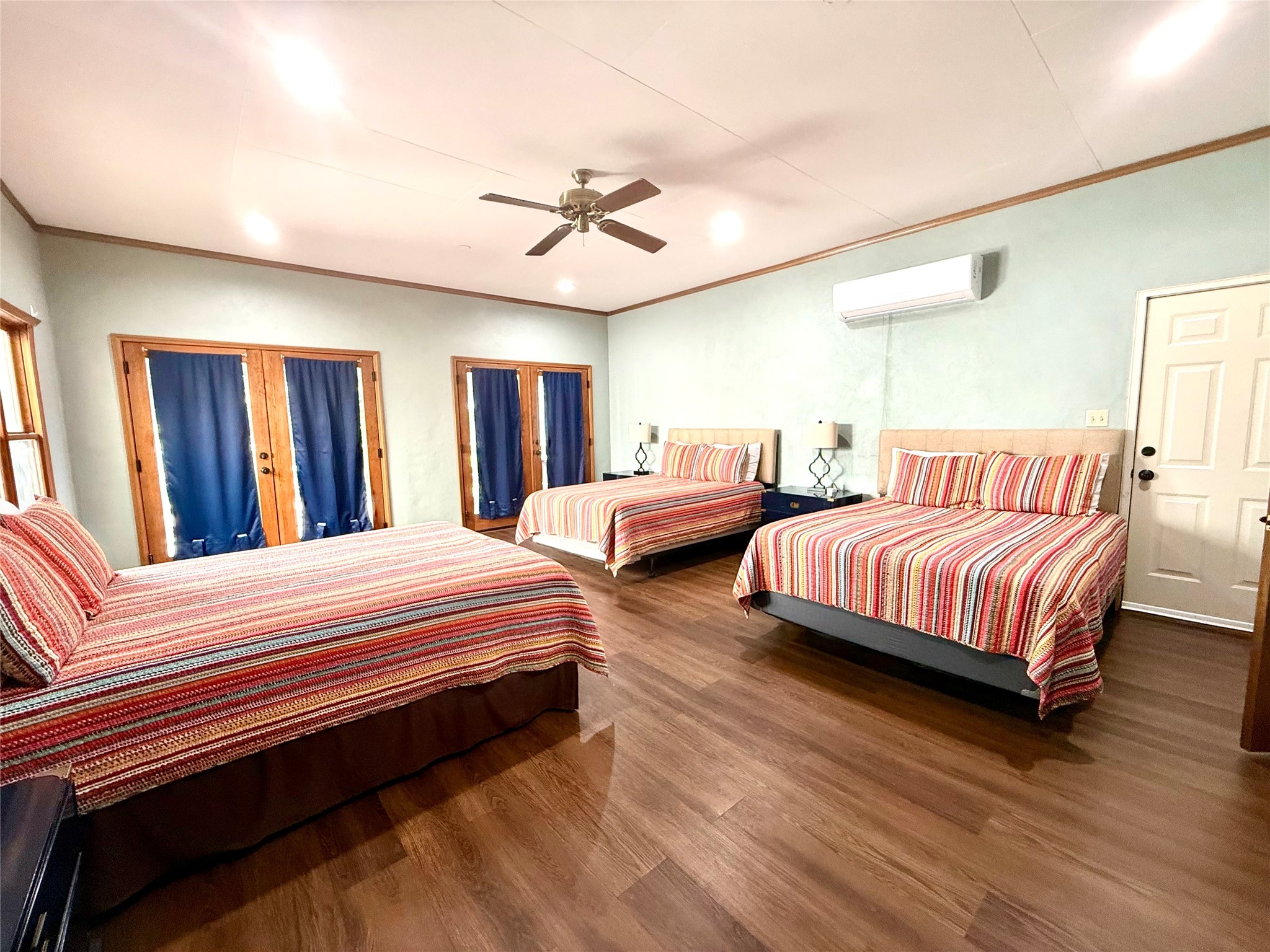 9030 River Road New Braunfels, TX 78132 - Photo 23 of 25 a bedroom with bed and wooden floor