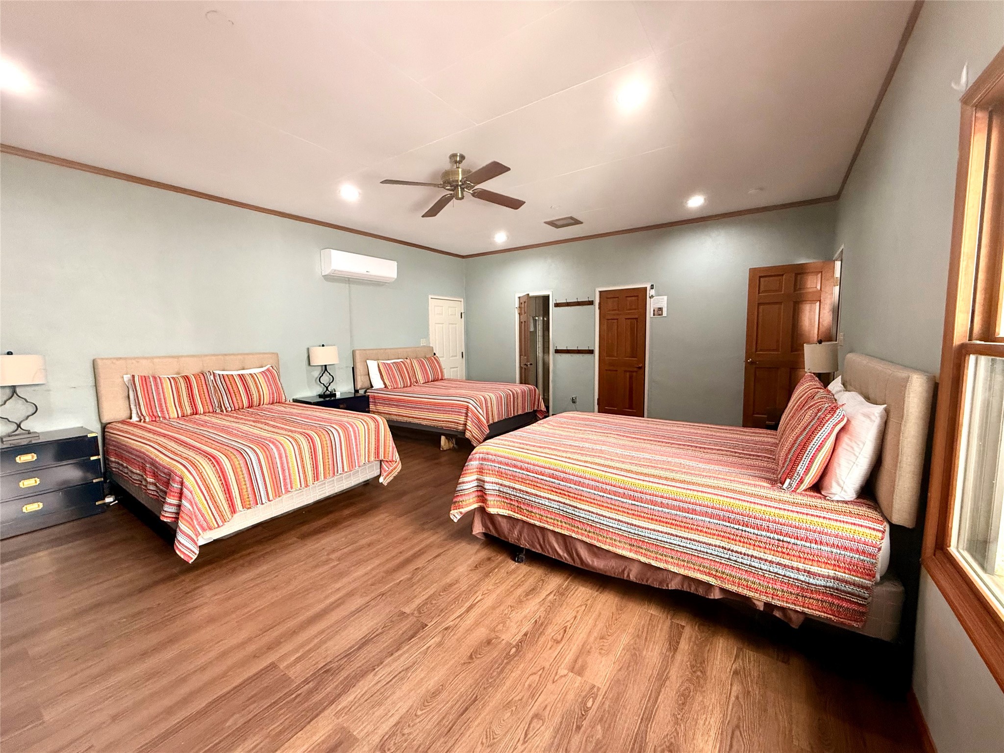 9030 River Road New Braunfels, TX 78132 - Photo 24 of 25 a bedroom with two beds and painting on the wall