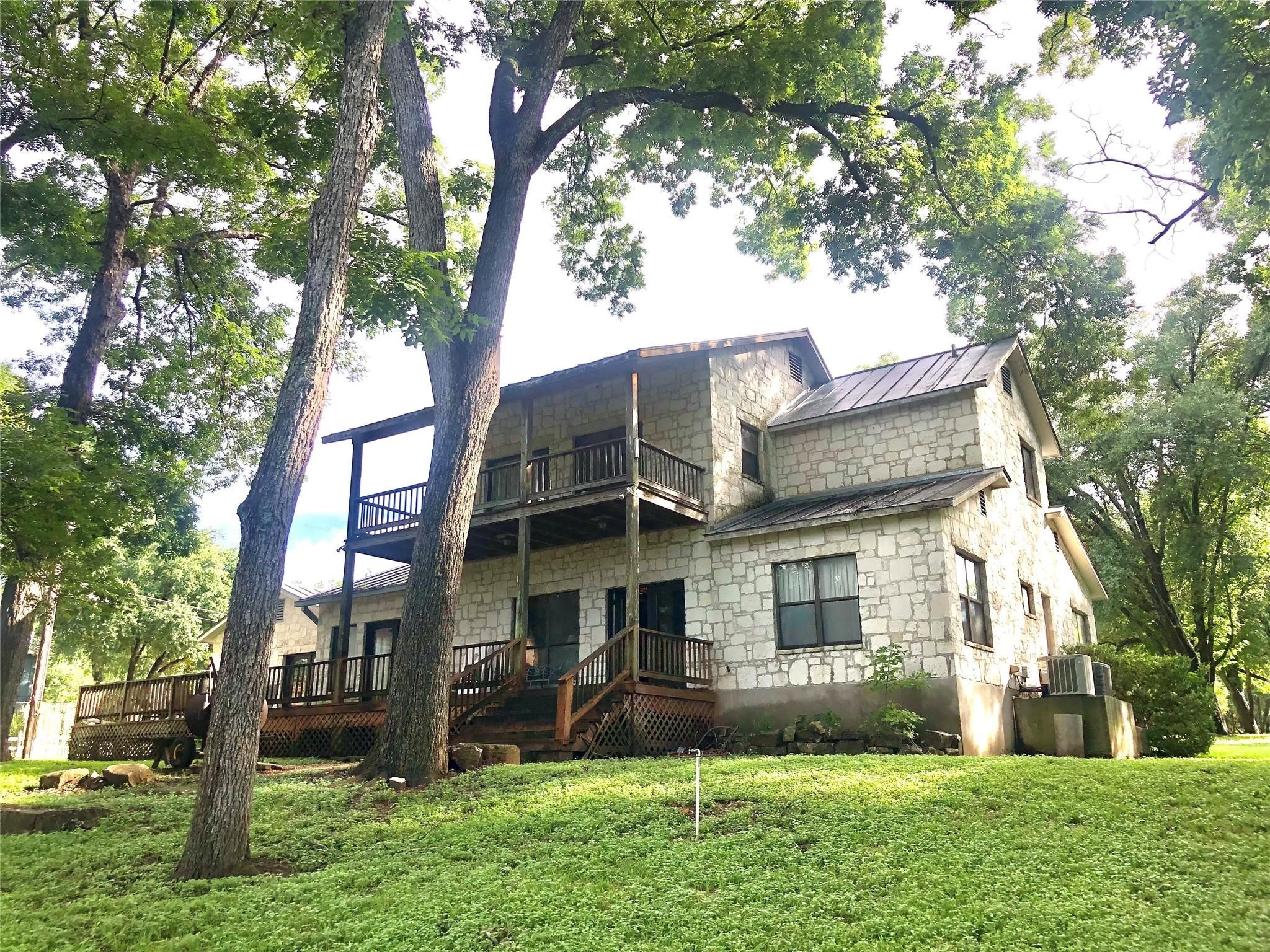 9030 River Road New Braunfels, TX 78132 - Photo 5 of 25 front view of house with a yard