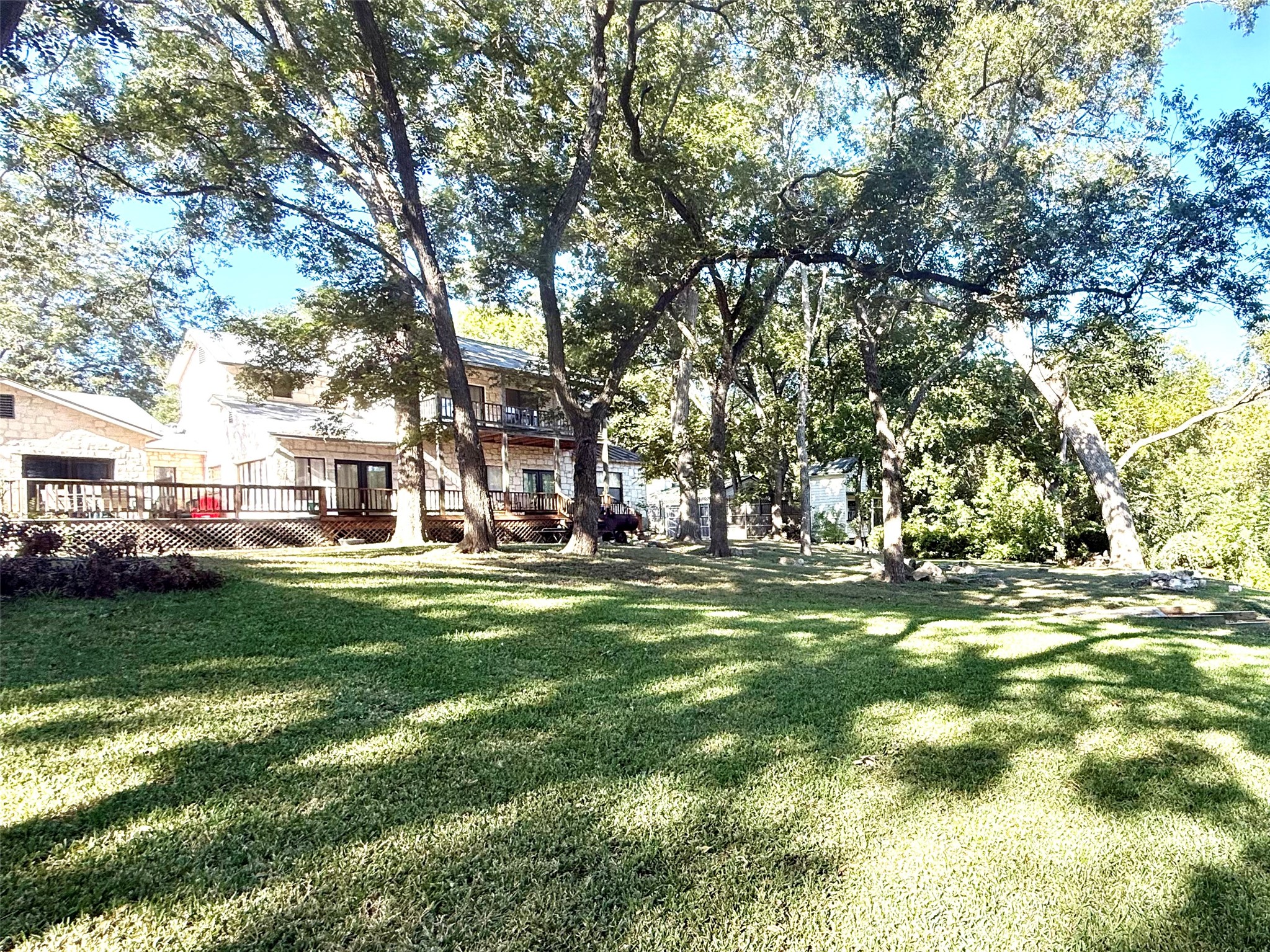 9030 River Road New Braunfels, TX 78132 - Photo 6 of 25 a view of a park with large trees