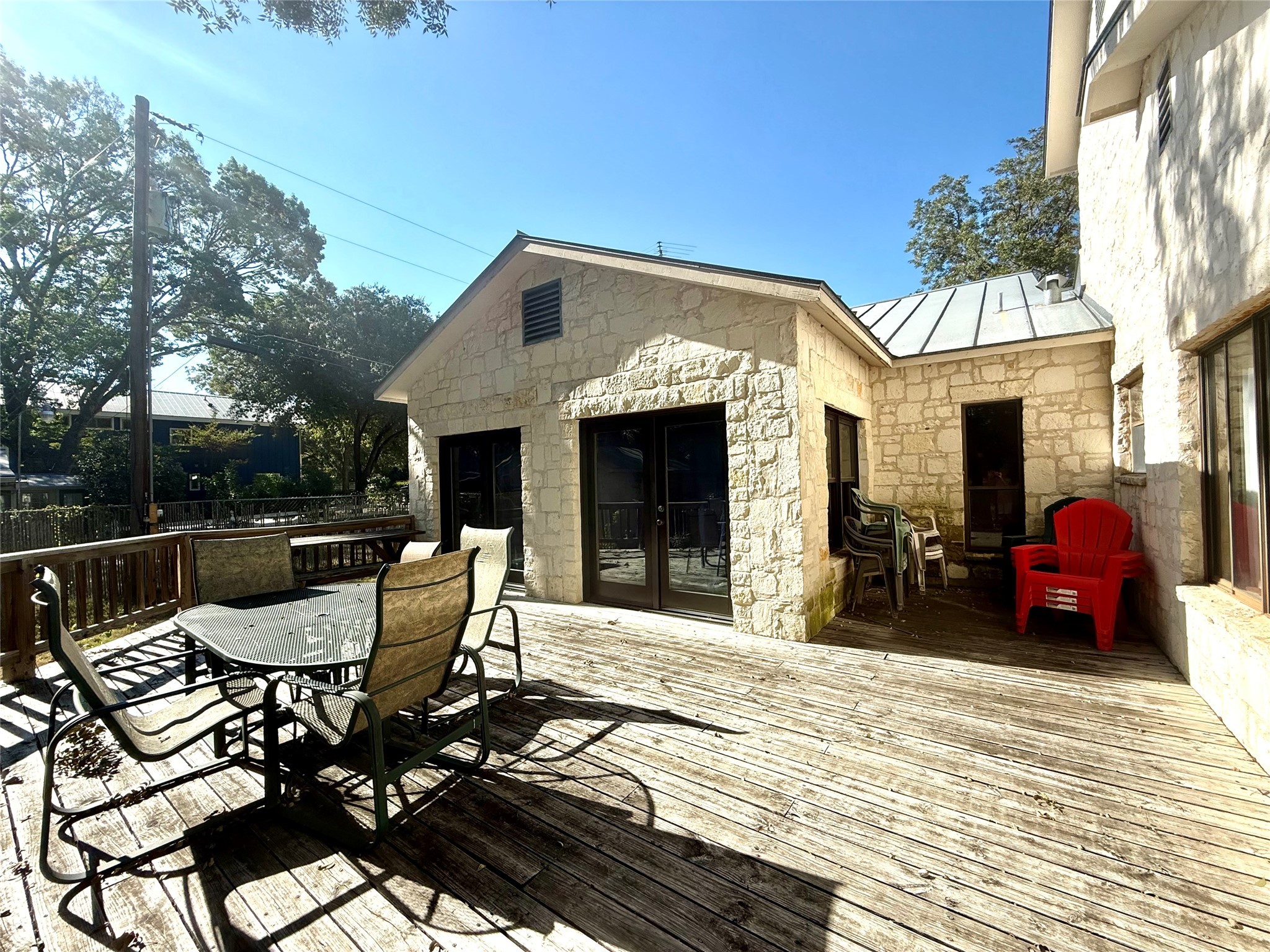 9030 River Road New Braunfels, TX 78132 - Photo 10 of 25 a view of a patio with table and chairs and potted plants