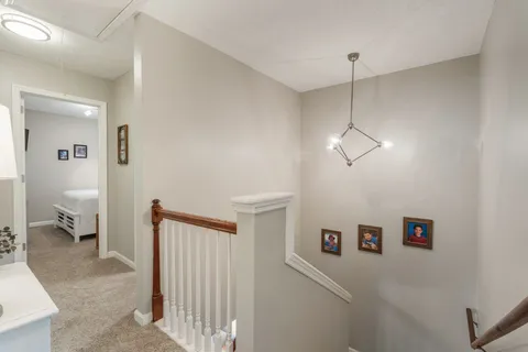 a view of a hallway with closet
