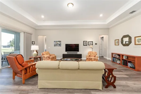 a large kitchen with a table and chairs