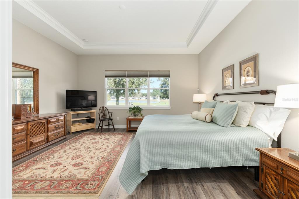 8843 Southwest 57th Pl Road Ocala, FL 34481 - Photo 29 of 64 a bedroom with a bed and a television