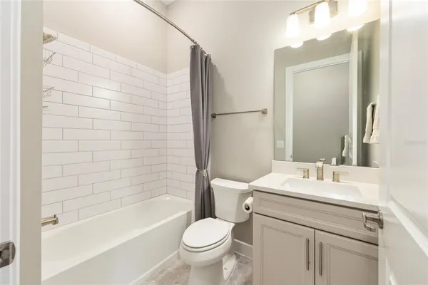 an aerial view of a house with a swimming pool