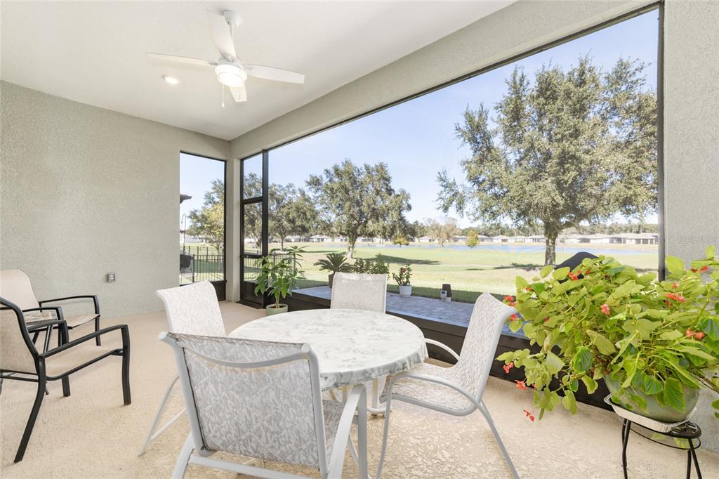 8843 Southwest 57th Pl Road Ocala, FL 34481 - Photo 4 of 64 a view of a dining room with furniture window and outside view