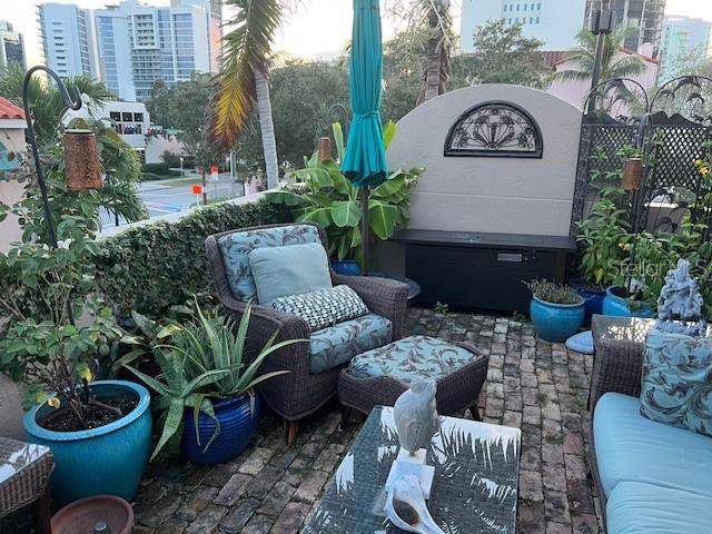 200 Cocoanut Avenue, Unit 7 Sarasota, FL 34236 - Photo 31 of 32 a view of a patio in backyard