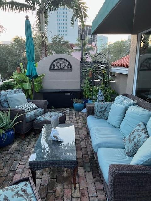 200 Cocoanut Avenue, Unit 7 Sarasota, FL 34236 - Photo 32 of 32 a view of a couches in patio