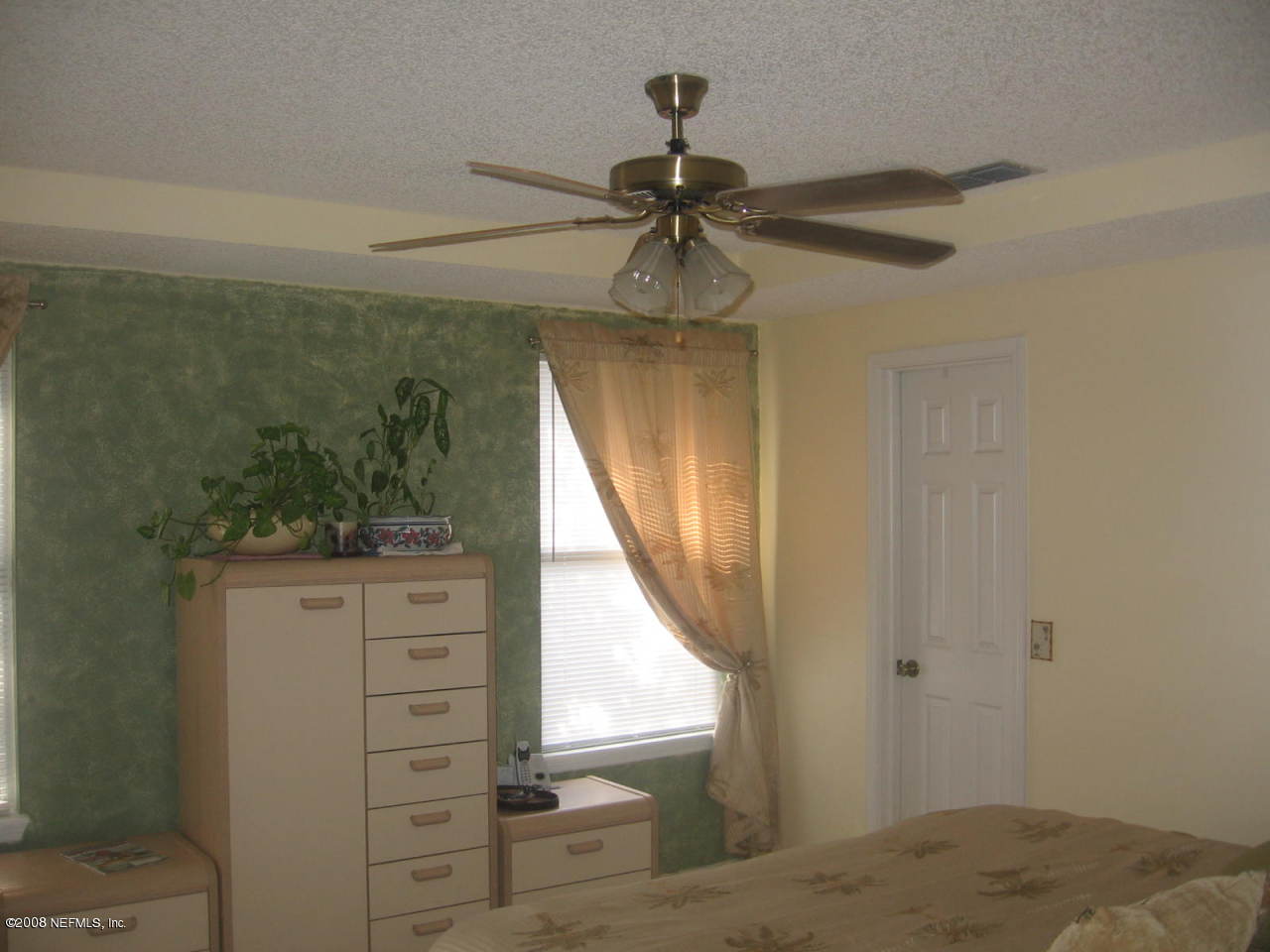 8492 Springtree Road Jacksonville, FL 32210 - Photo 13 of 16 Master Bedroom