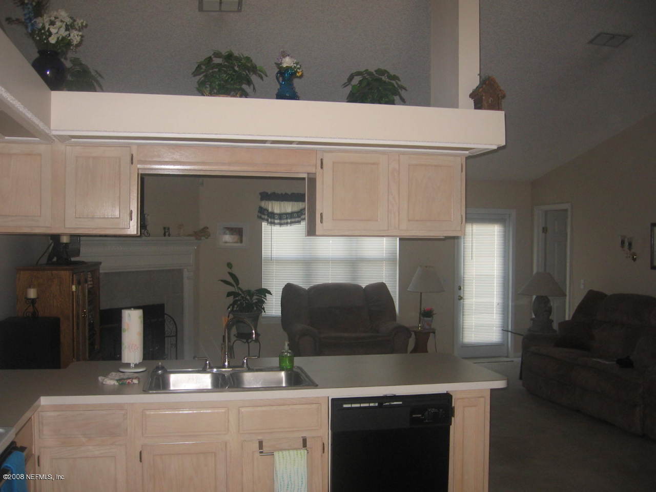 8492 Springtree Road Jacksonville, FL 32210 - Photo 8 of 16 Kitchen to Living Room