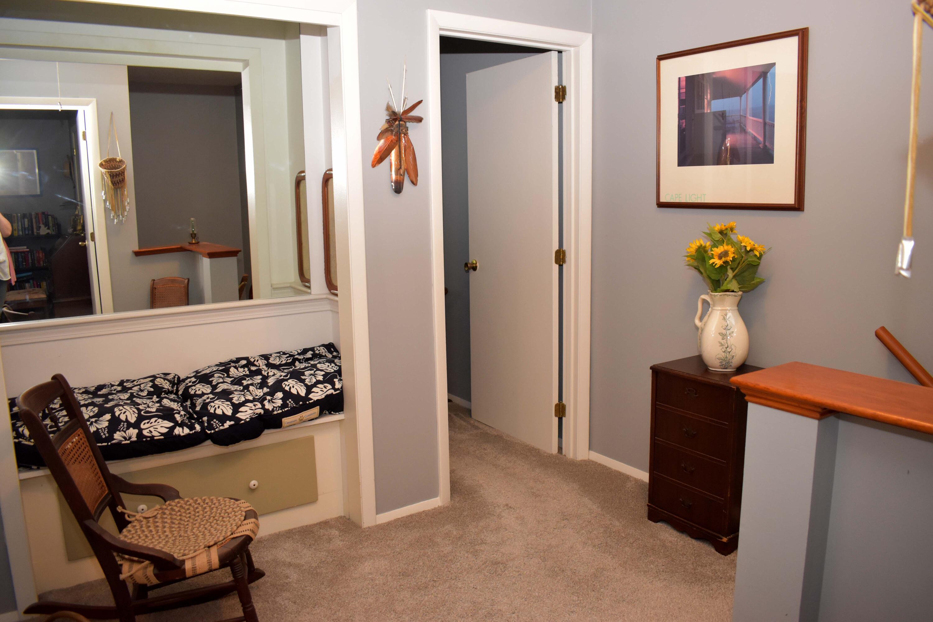 6 Round House Road Bourne, MA 02532 - Photo 11 of 25 a view of a hallway with wooden floor and a potted plant