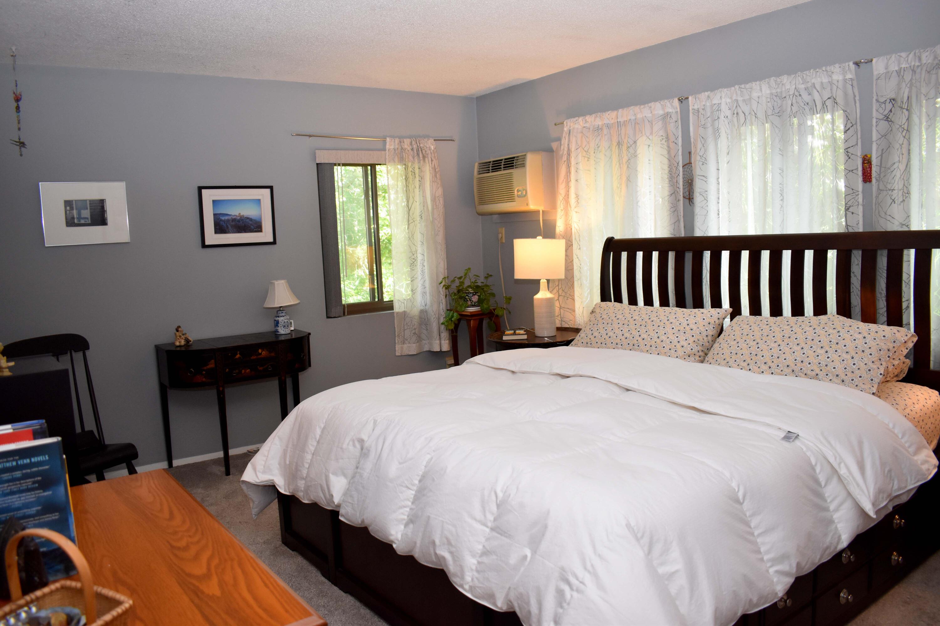 6 Round House Road Bourne, MA 02532 - Photo 13 of 25 a bed sitting in a bedroom next to a window