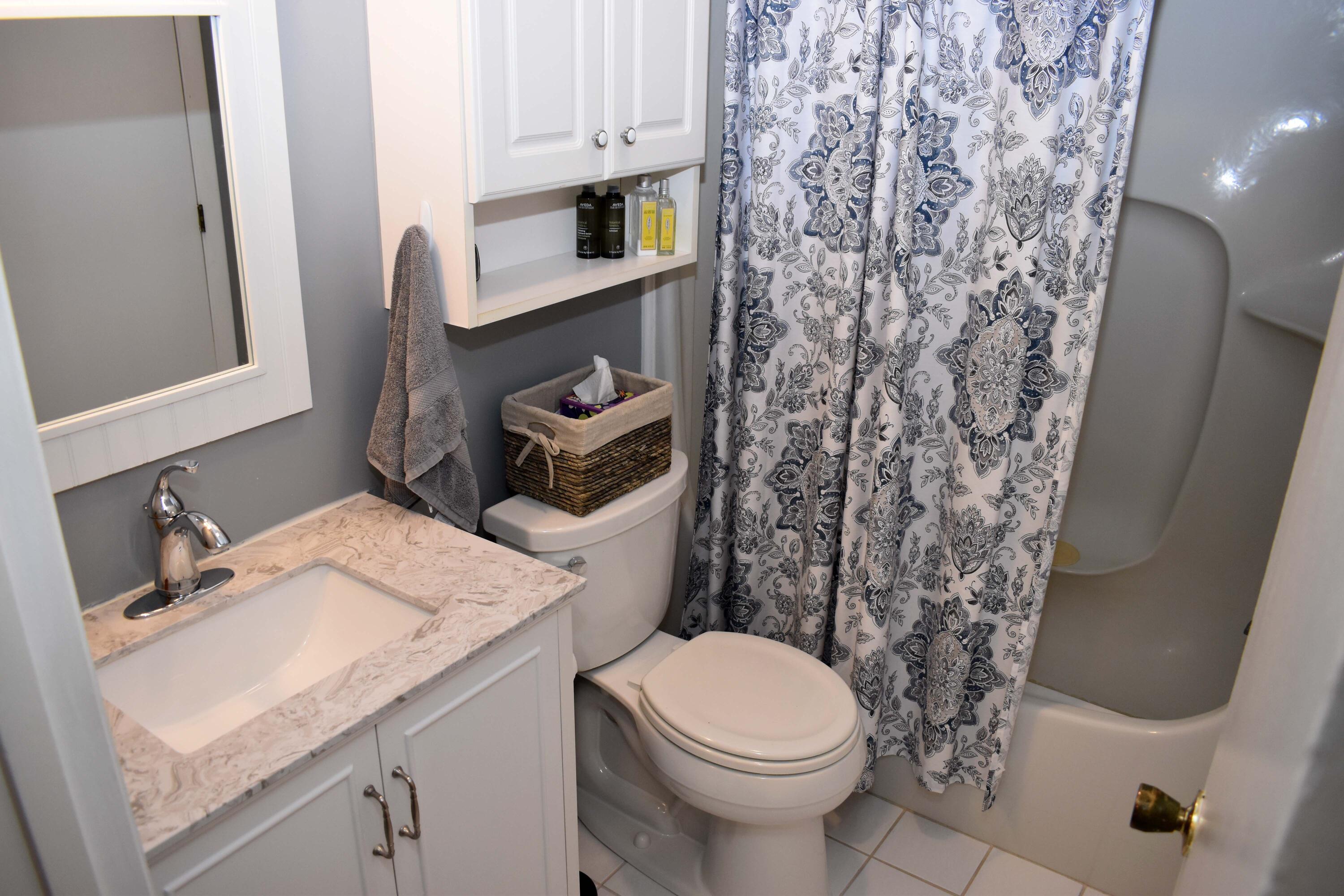 6 Round House Road Bourne, MA 02532 - Photo 17 of 25 a bathroom with a sink toilet and shower
