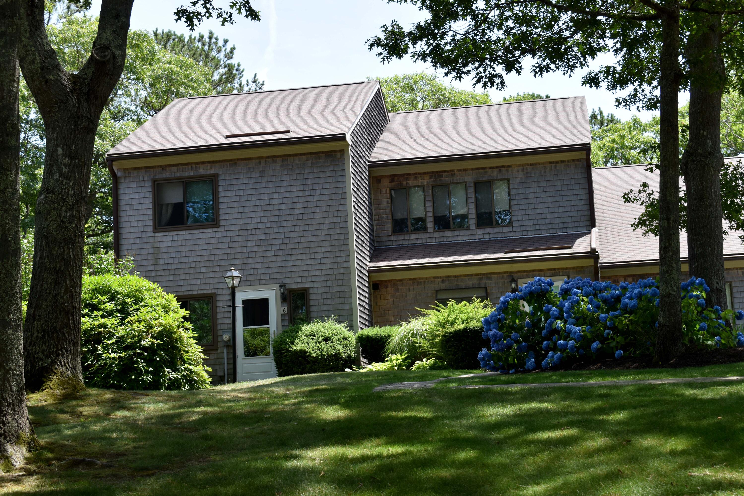 6 Round House Road Bourne, MA 02532 - Photo 2 of 25 a view of a house with a garden