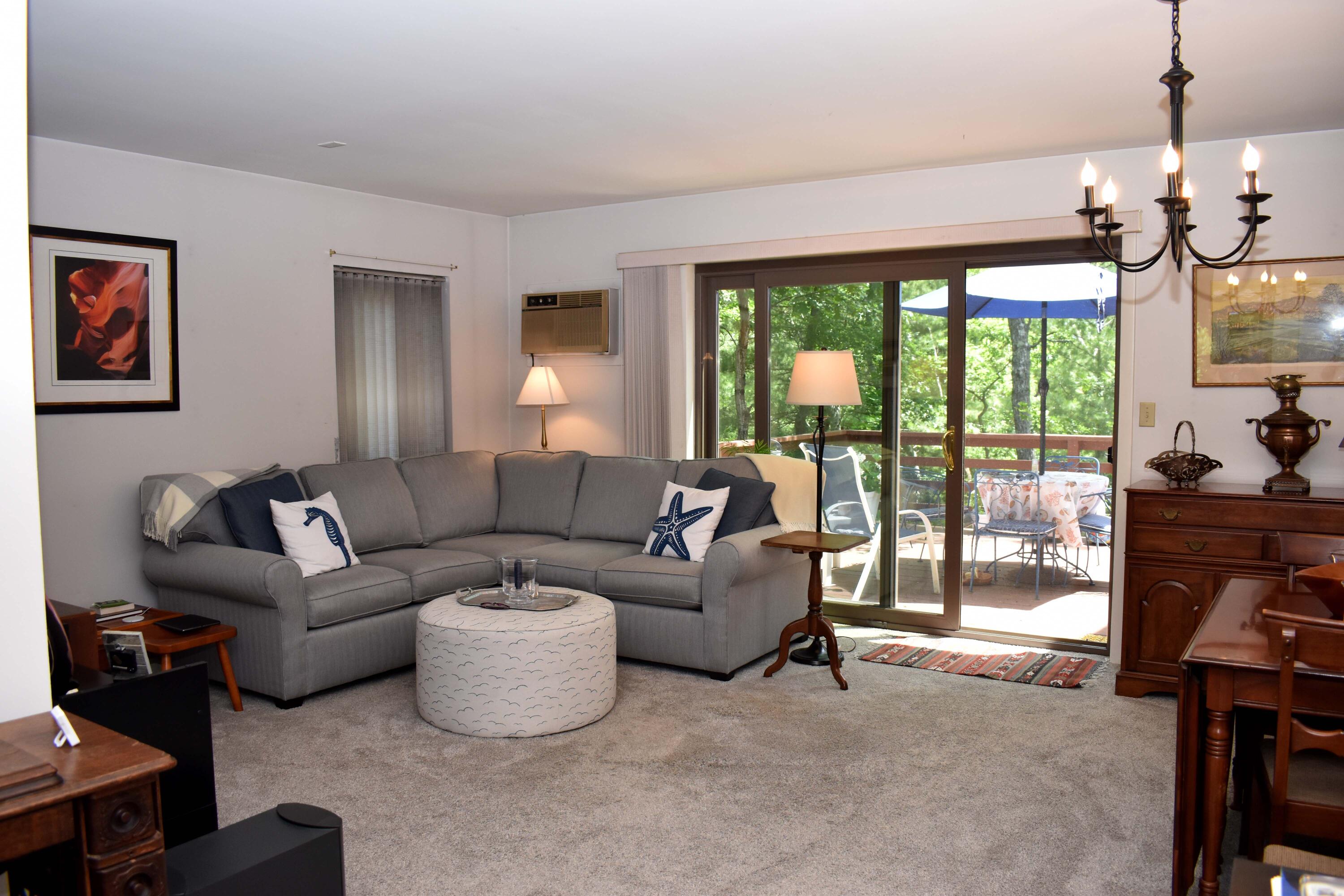 6 Round House Road Bourne, MA 02532 - Photo 5 of 25 a living room with furniture and a large window