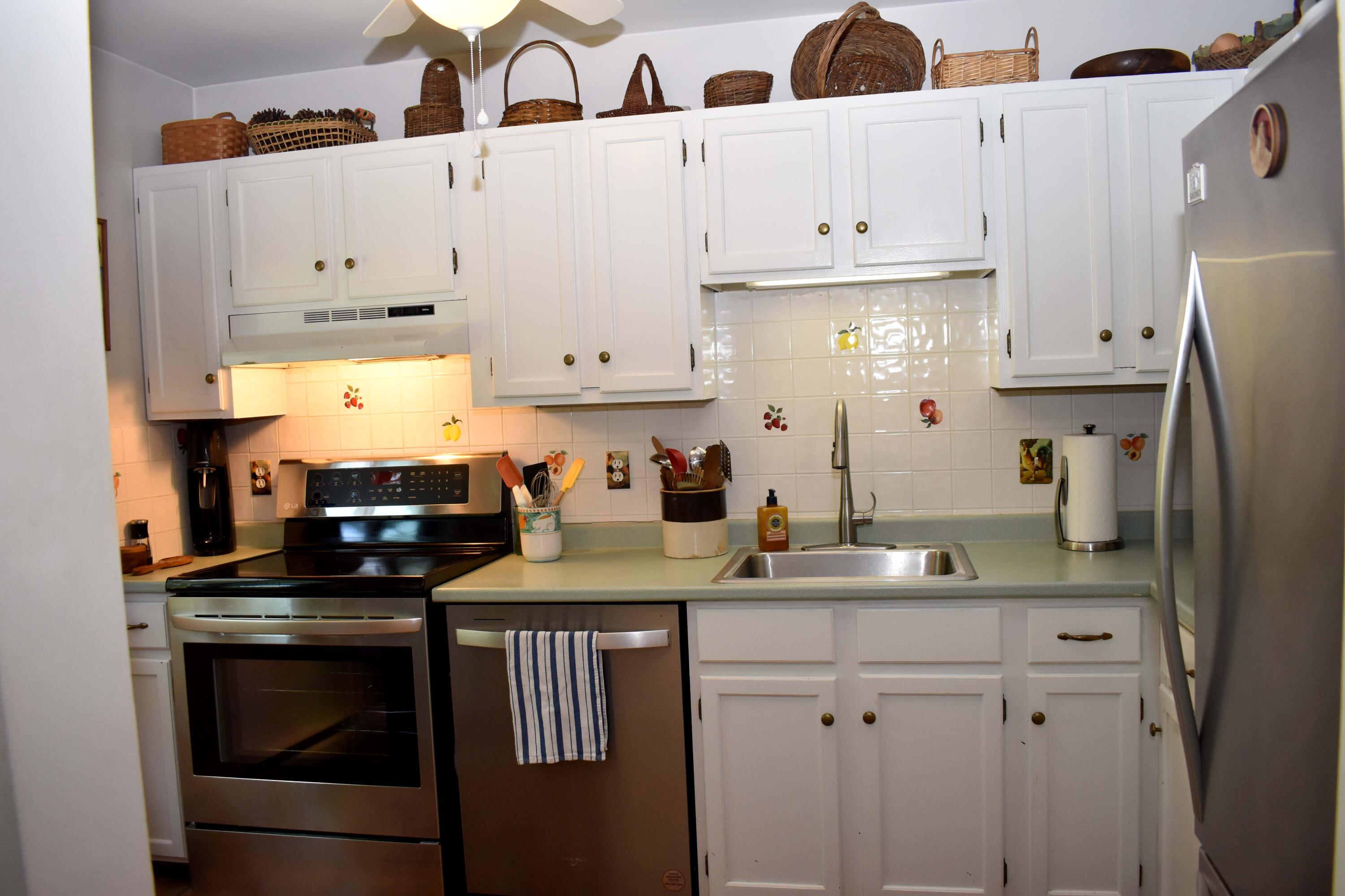 6 Round House Road Bourne, MA 02532 - Photo 7 of 25 a kitchen with stainless steel appliances granite countertop a sink stove and refrigerator